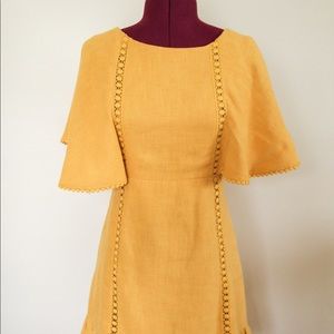 Yellow Anthropologie flounce sleeve dress